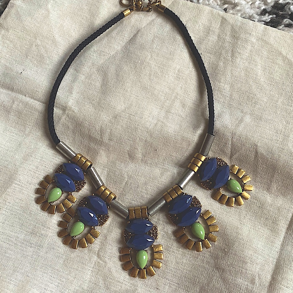 Statement necklace from Jcrew. Brass and metal hardware  with jade/purple stones